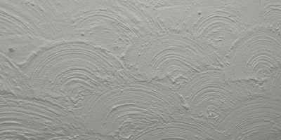 Asbestos-containing textured coating to ceiling (ARTEX).
